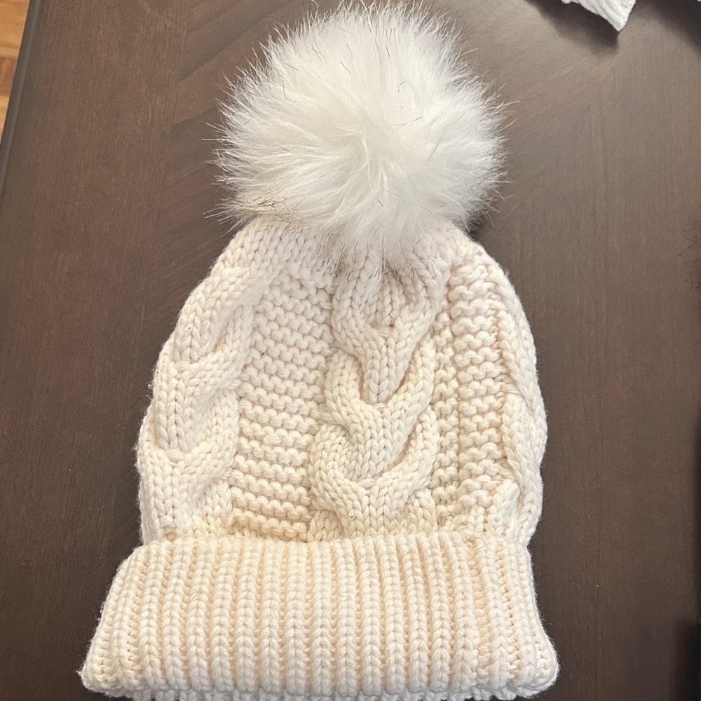 Express Fuzzy Pom Pom Beanie in a cream cable-knit - Picture 3 of 3